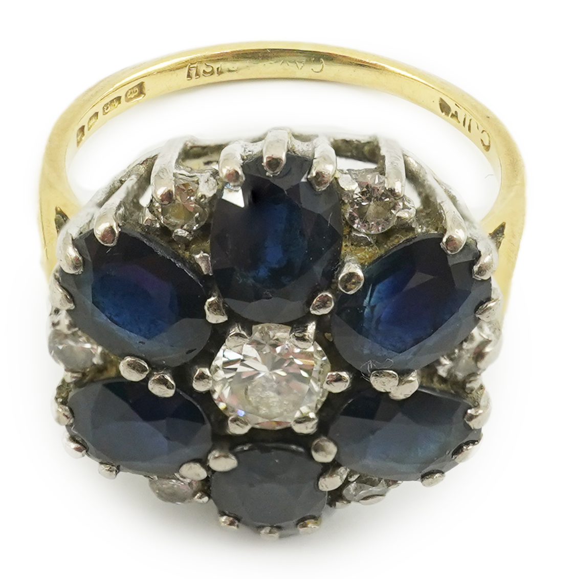 A 1970's 18ct gold, sapphire and diamond set circular cluster ring